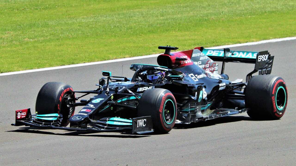 Lewis Hamilton black and green car